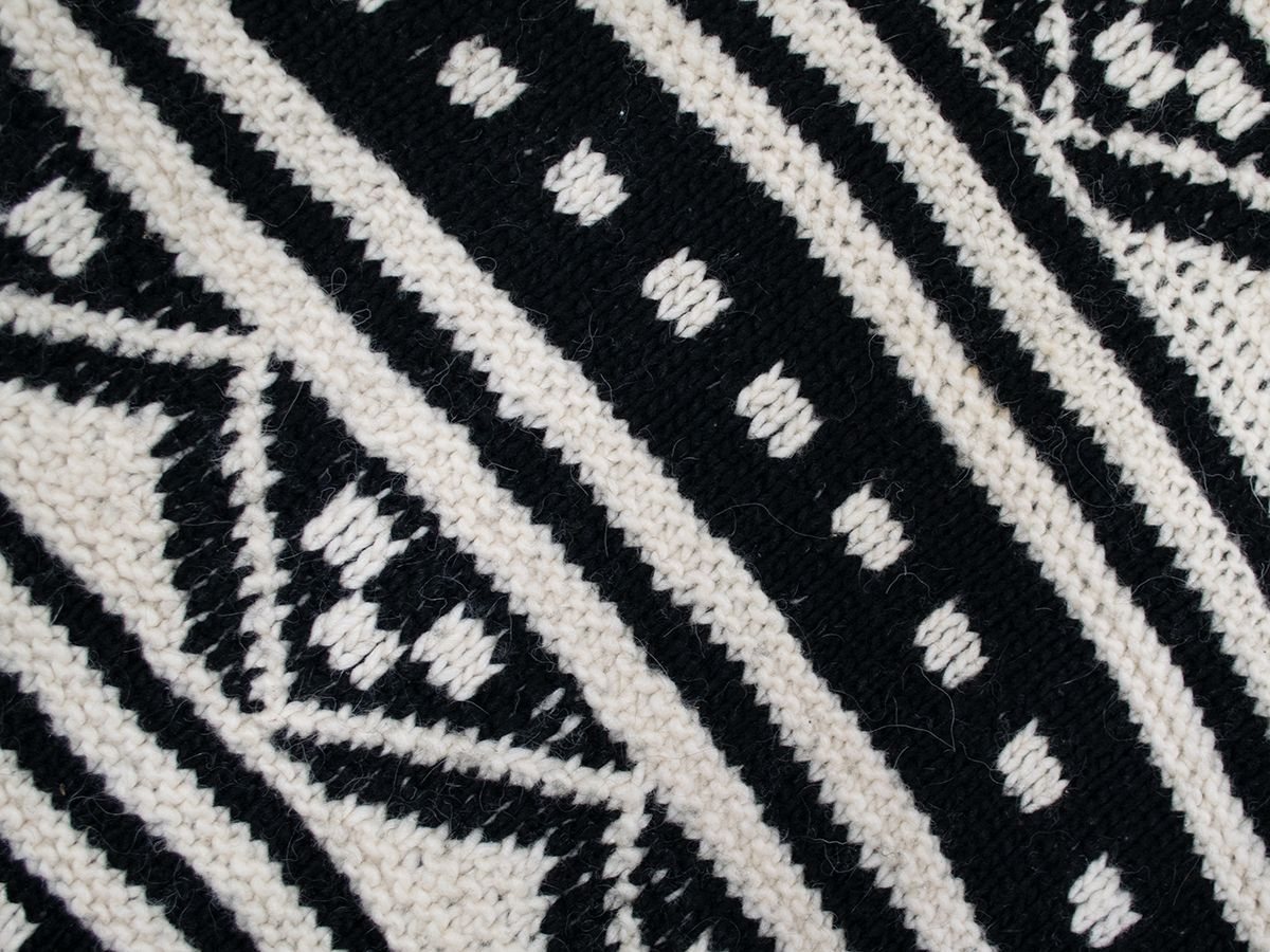 編み